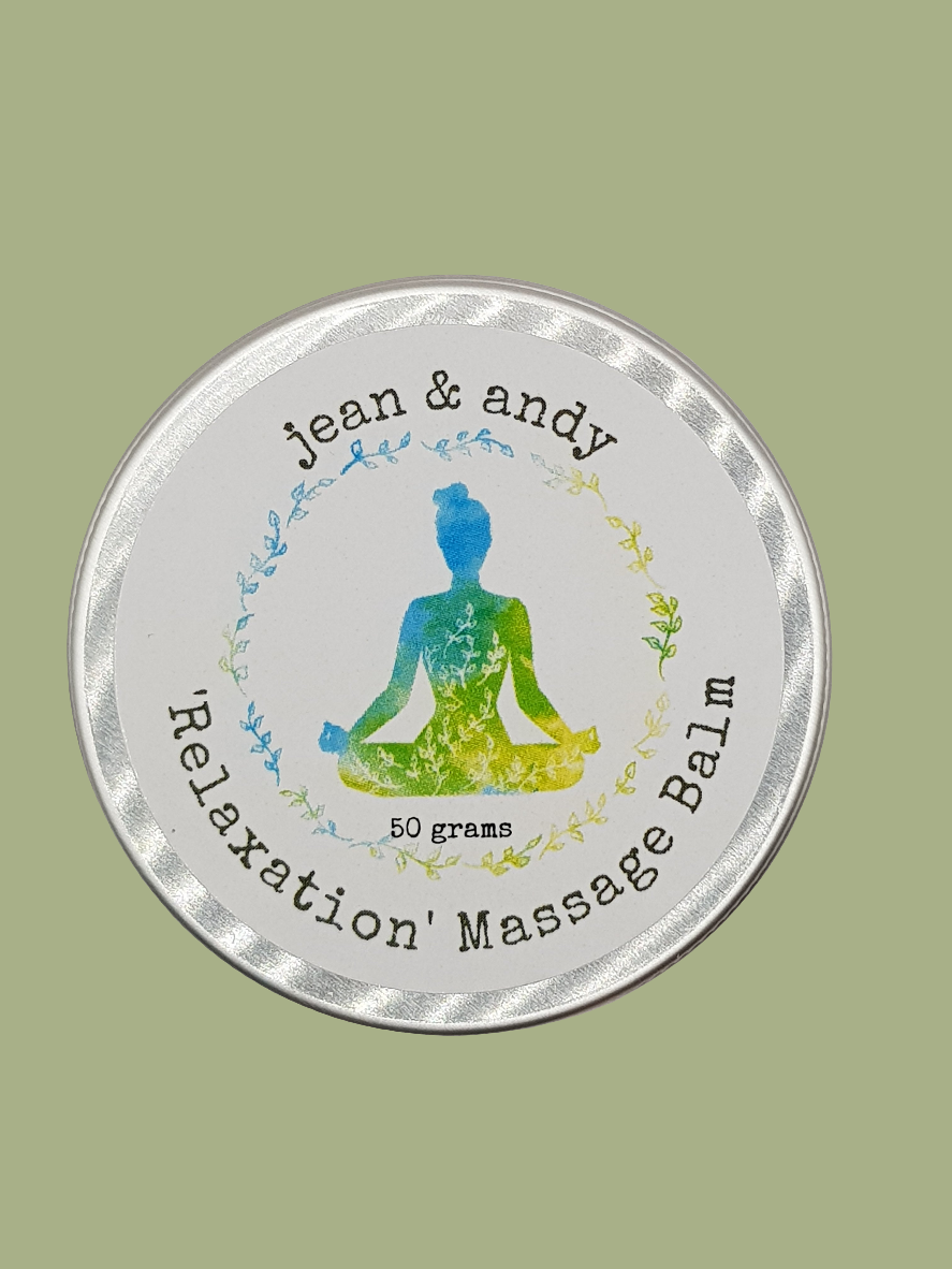 A 50-gram round tin labeled Jean & Andy Relaxation Massage Balm showcases a vibrant silhouette of a meditating figure encircled by a wreath of leaves against a light green backdrop, emphasizing its blend of essential oils ideal for serene meditation sessions.